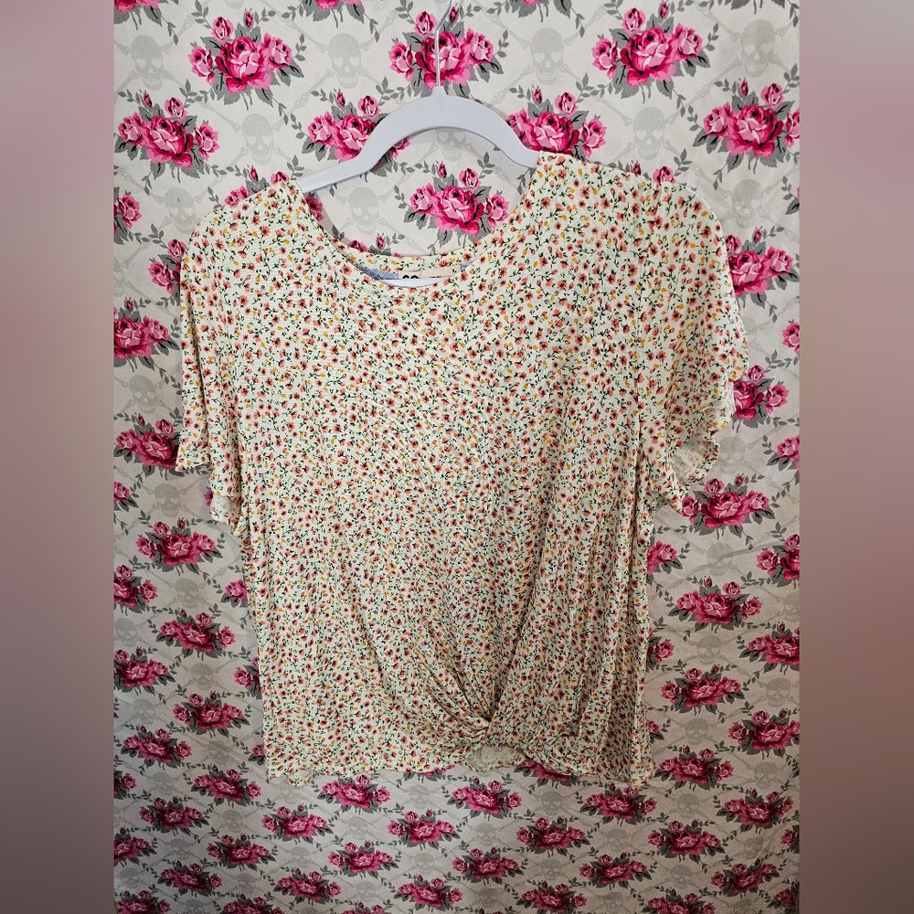 Cute floral top with lace back